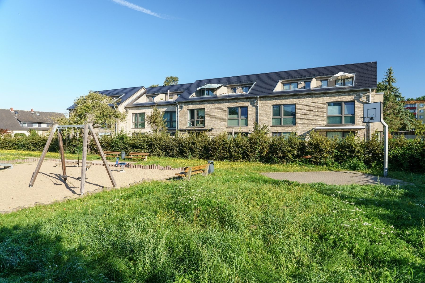 Haus mit Spielplatz